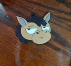 Close-up of a 3D printed grumpy horse keychain made from PLA
