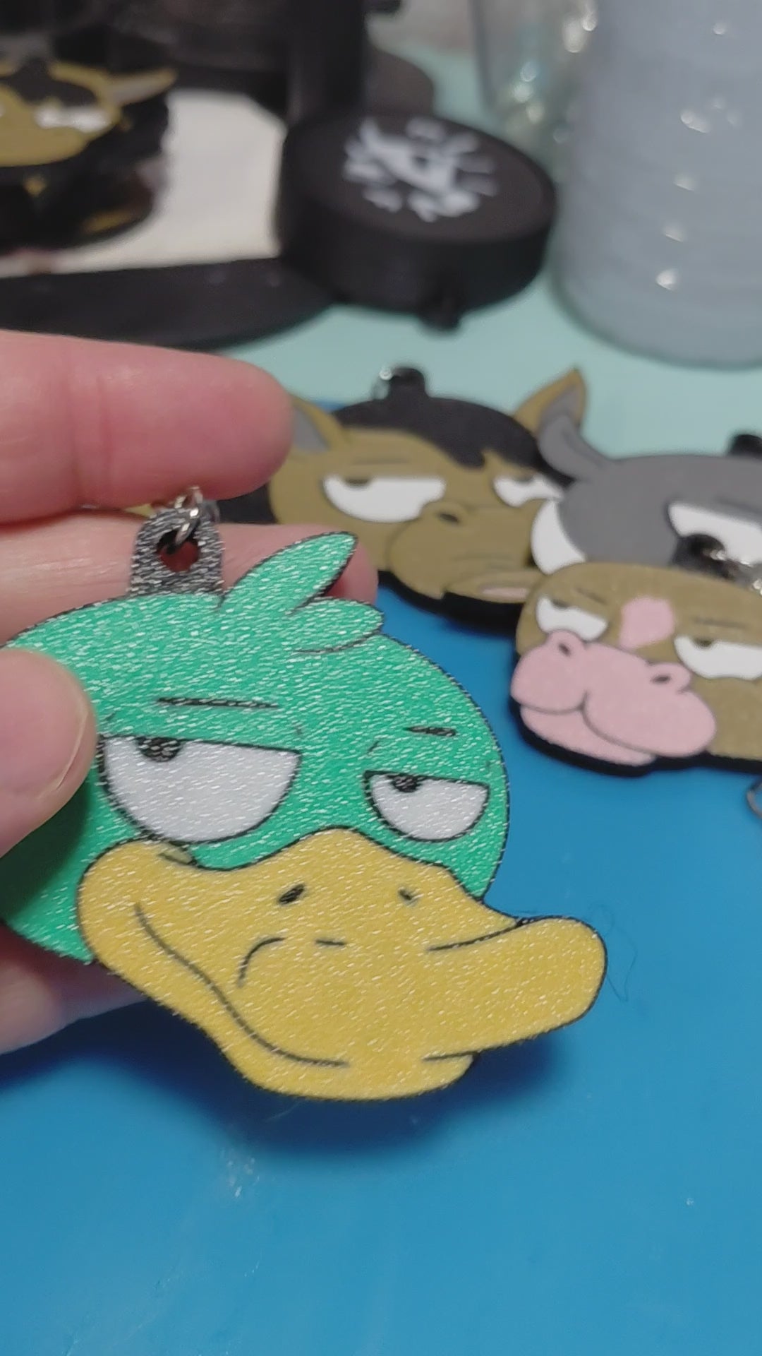 video of 3d printed grumpy duck keychain